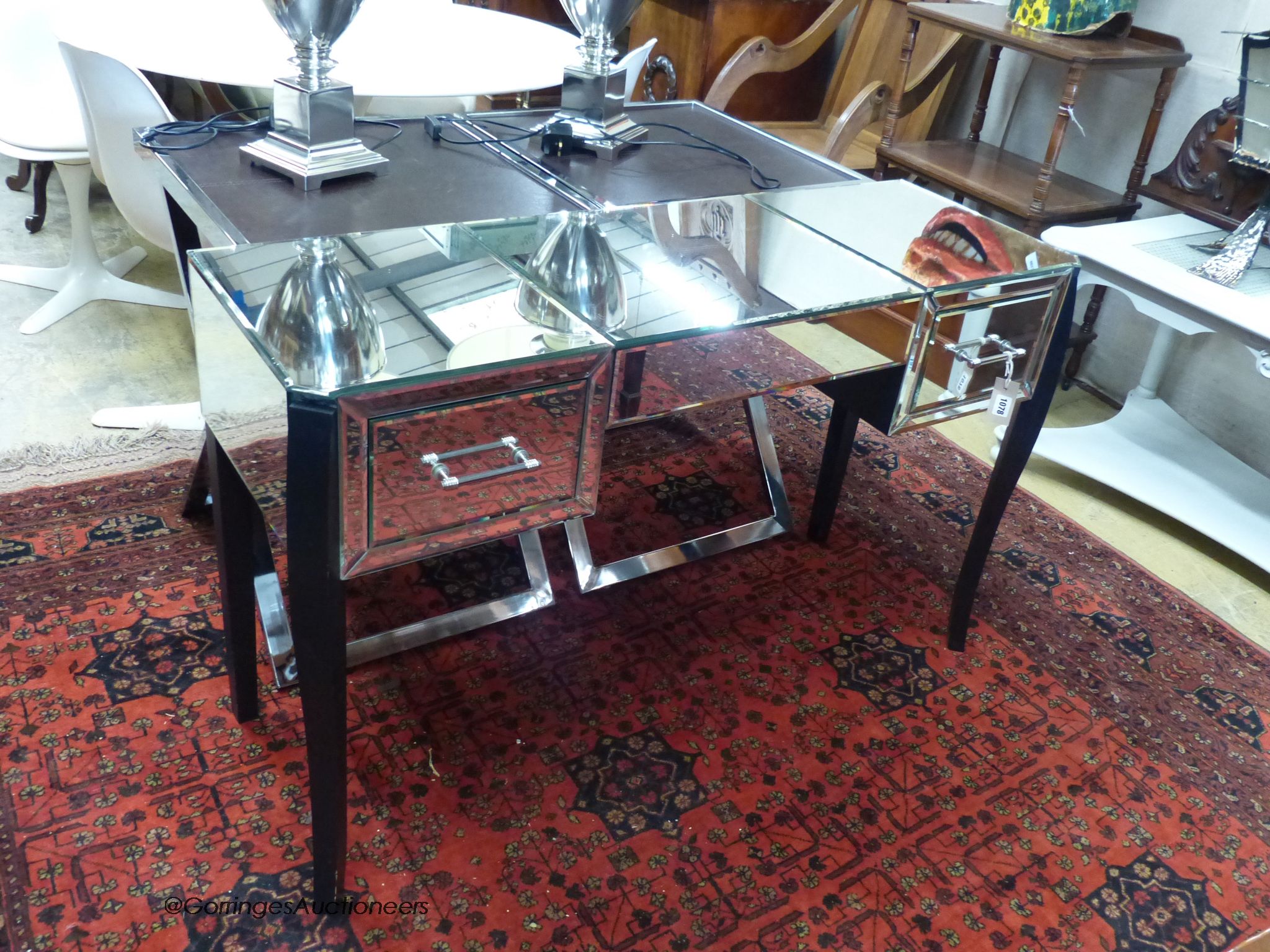 A 'Gatsby' mirrored dressing table by Laura Ashley, width 122cm, depth 41cm, height 76cm